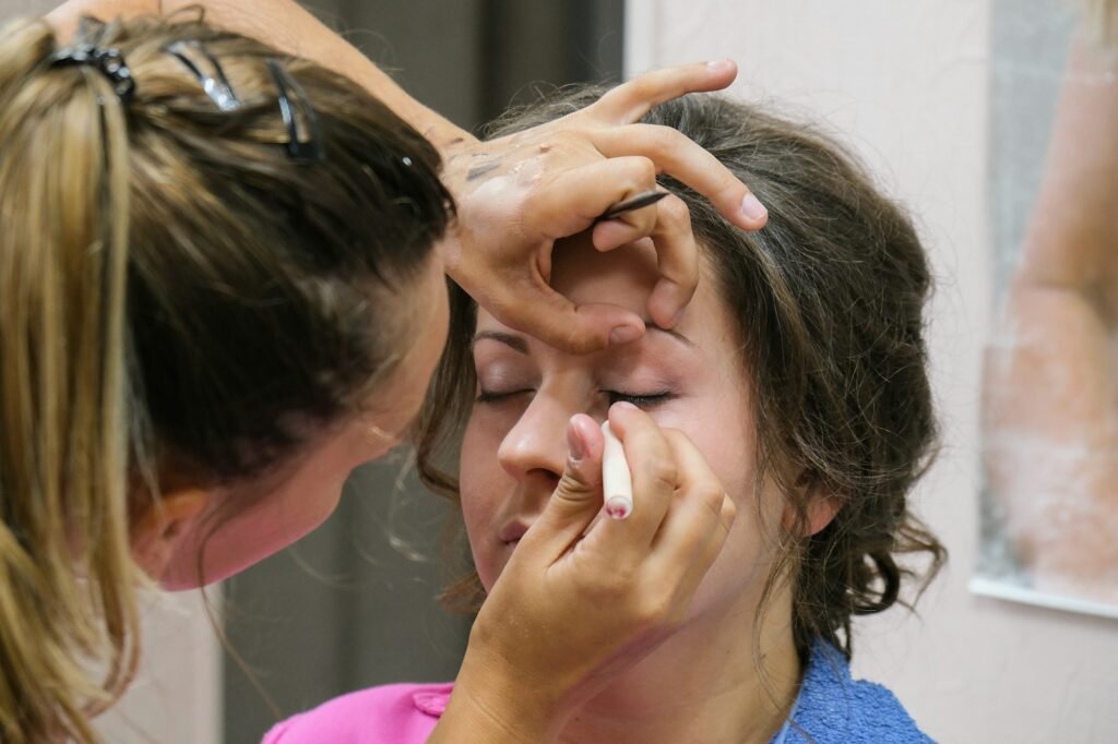 Makeup artist providing services at an event in Dubai, UAE